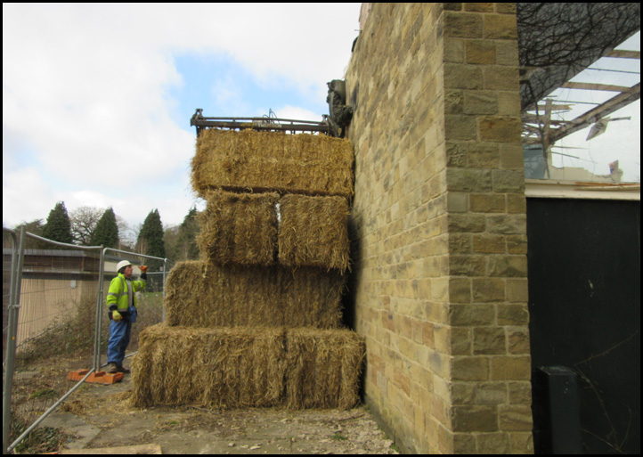 Positioning bales of hay to protect the Tympanum from accidental collapse