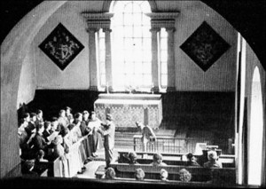 Brian Longthorne conducting a performance of Heinrich Schutz's St Matthew Passion in the Estate Chapel in 1954. (Image from Paul Mann publication.)
