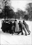 Students rescuing Daphne Bird in her car - 1951
